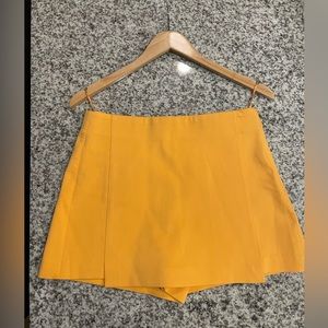 Zara mini skort size small (S). Pastel orange color.